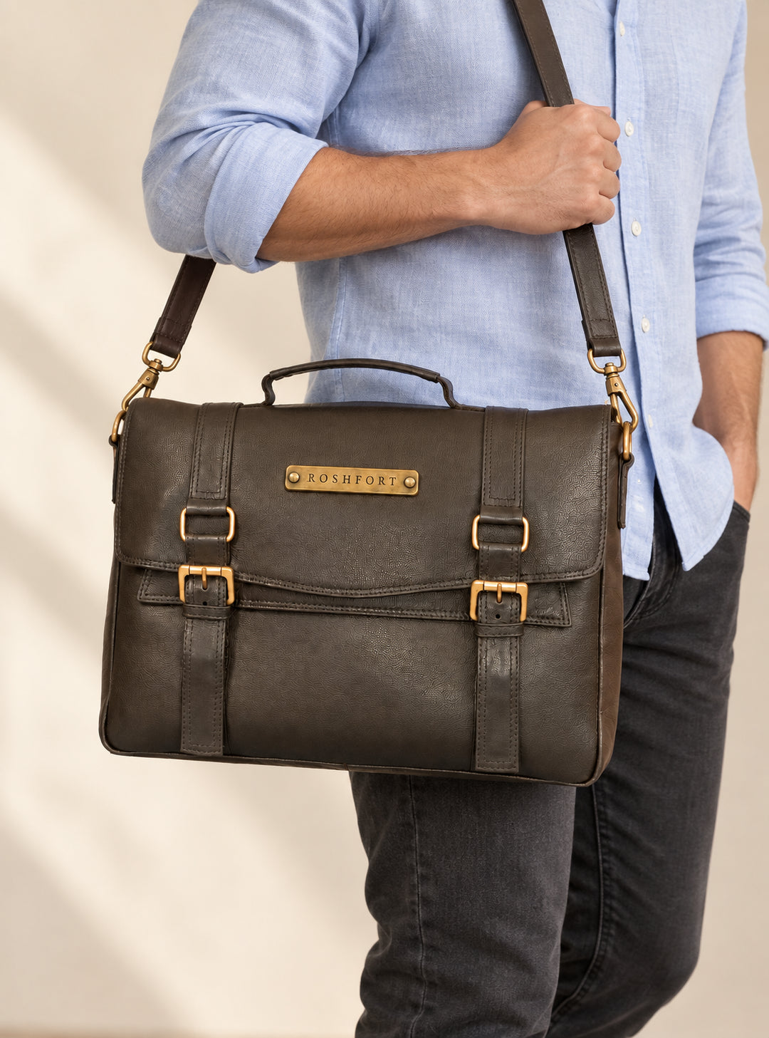 Man carrying the Aldofine olive briefcase on the shoulder strap