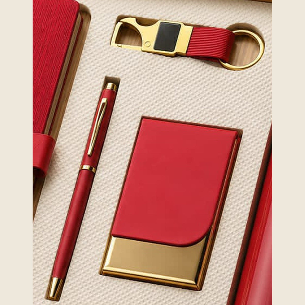 Crimson twist pen, card holder and keychain with gold trim