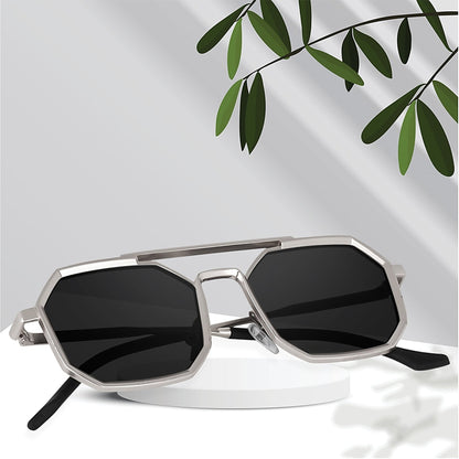 ROSHFORT silver octagonal sunglasses on a plinth with foliage shadows