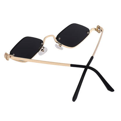 Gold faceted sunglasses at an angle showing the open top edge