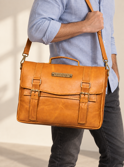 Man carrying the Aldofine tan briefcase on the shoulder strap