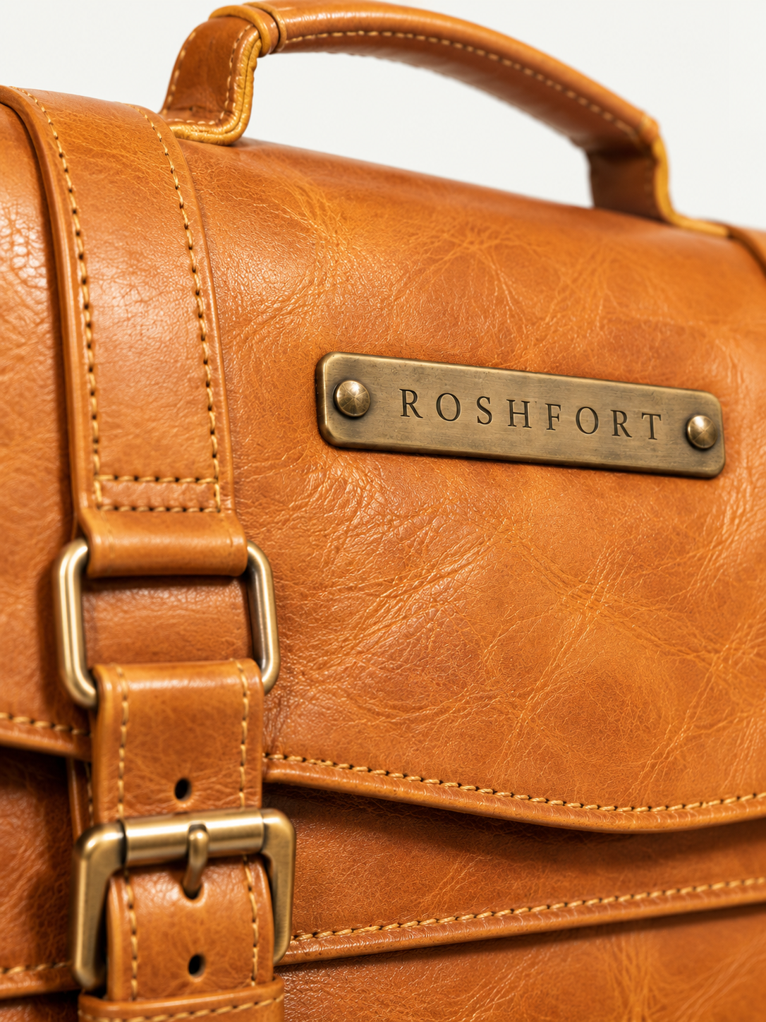 ROSHFORT brass name plate on the flap