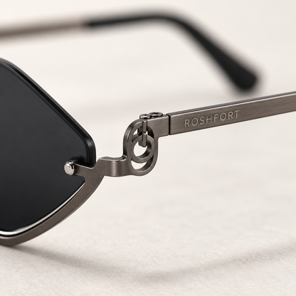 Close-up of ROSHFORT laser engraved on the temple of the Noir Facet sunglasses