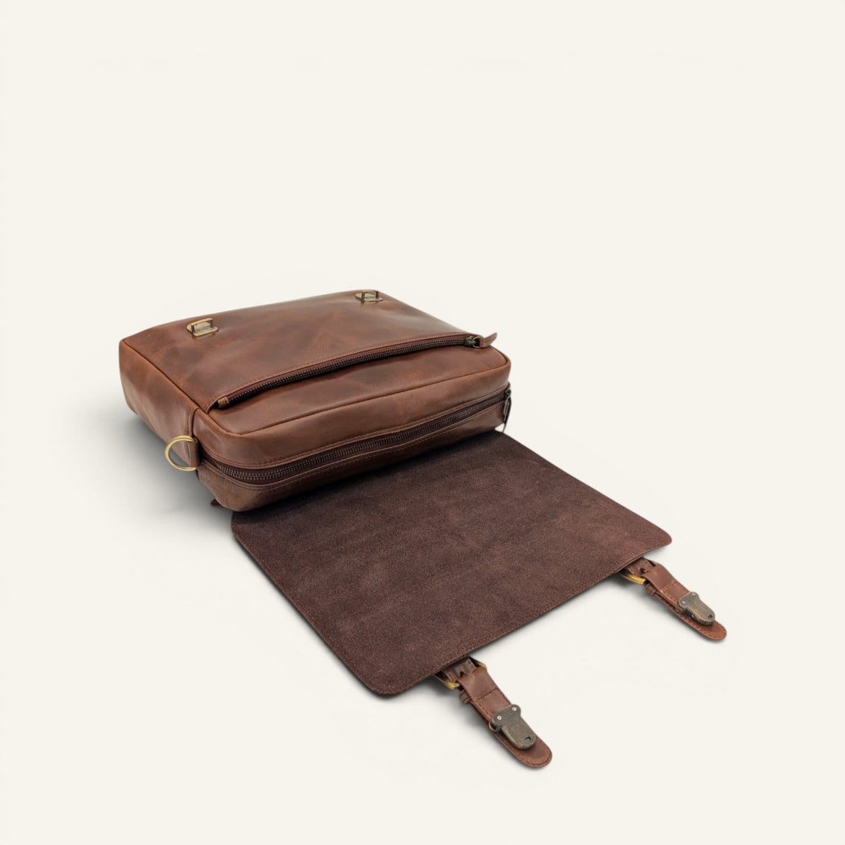 Italic Mont cognac satchel with the flap opened, suede underside