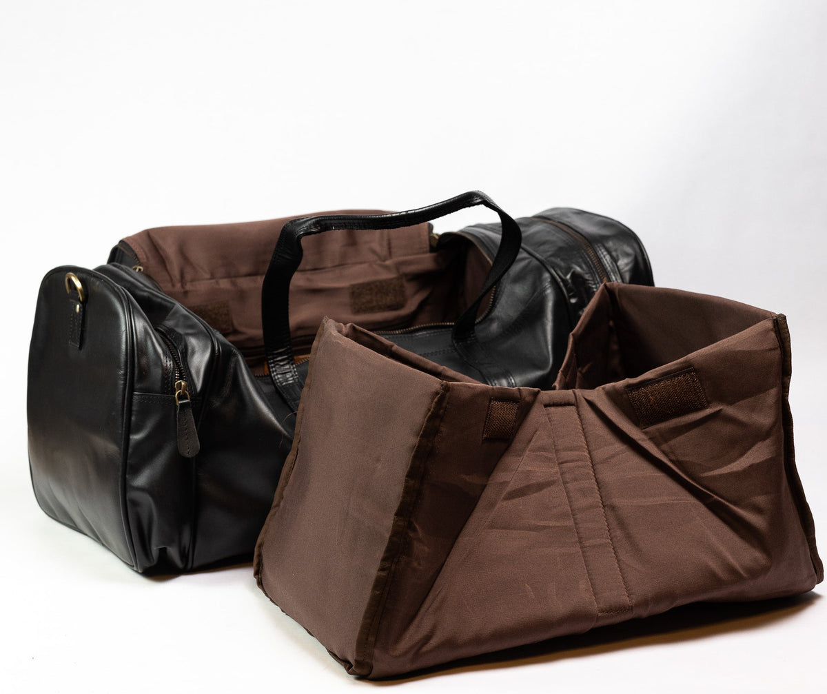 Interior of the black ROSHFORT Amsterdam duffle showing the brown fabric lining