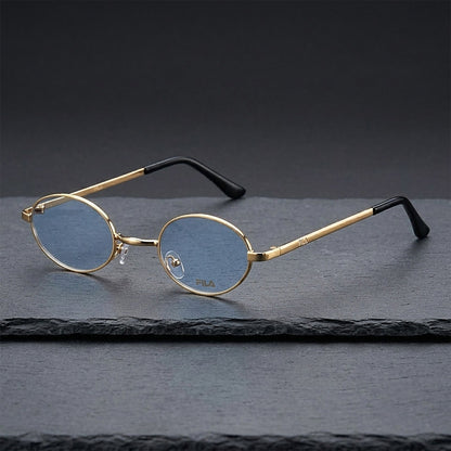 ROSHFORT gold oval blue-lens sunglasses resting on dark slate