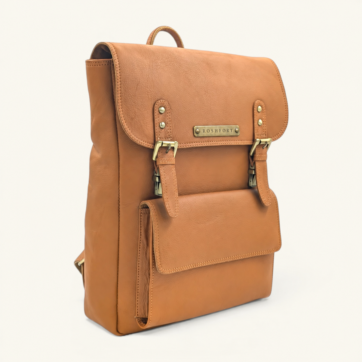 ROSHFORT Italic Royal leather backpack in tan, three quarter view